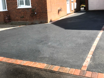Finished driveway installation by JJN Construction
